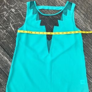 Lulu’s cuts and bolts sea green top